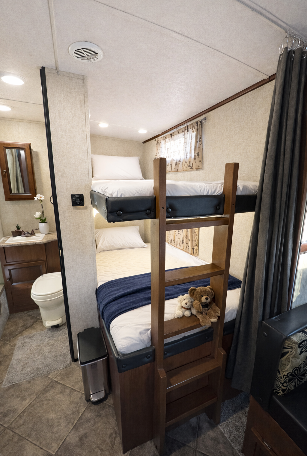 Family Adventure RV w/ 55” Projector | Luxury • Bunks • Half Ton Towable