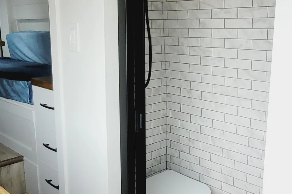 Cozy custom crafted van with Shower, Toilet, Heat, Solar and more!
