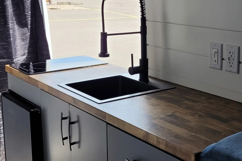 Cozy custom crafted van with Shower, Toilet, Heat, Solar and more!