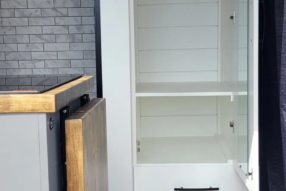 Cozy custom crafted van with Shower, Toilet, Heat, Solar and more!