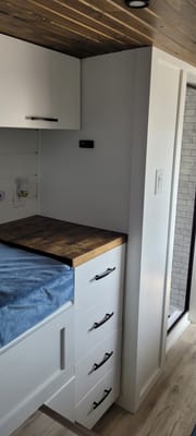 Cozy custom crafted van with Shower, Toilet, Heat, Solar and more!