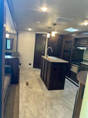 The Hutchins' Palomino 312TSQBK Travel Trailer