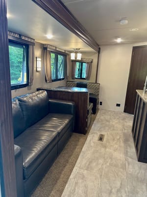 The Hutchins' Palomino 312TSQBK Travel Trailer