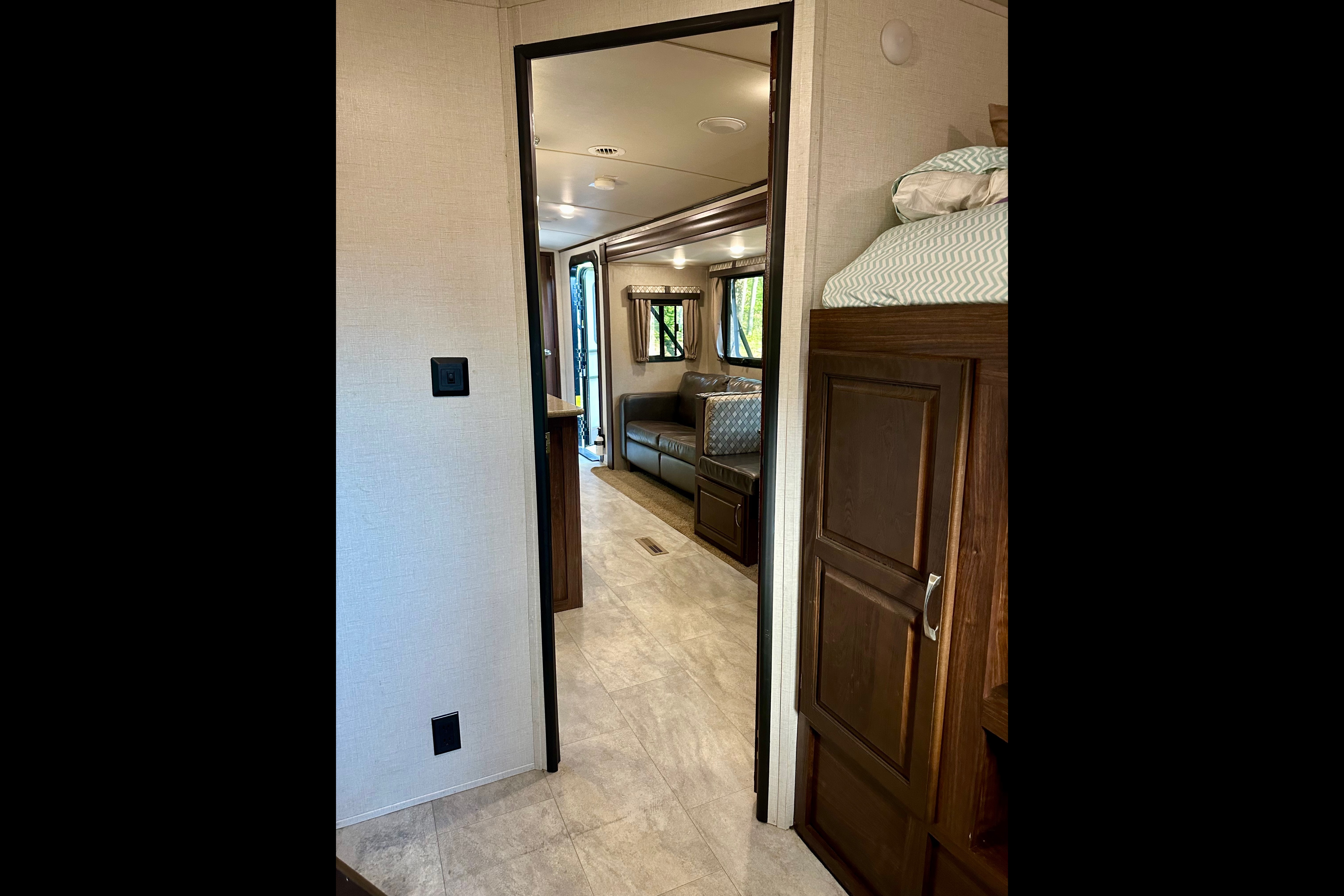 The Hutchins' Palomino 312TSQBK Travel Trailer