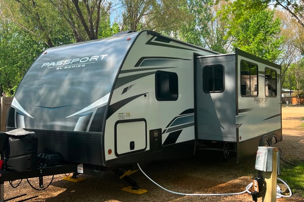 “Your Next Adventure” Keystone Passport SL Travel Trailer