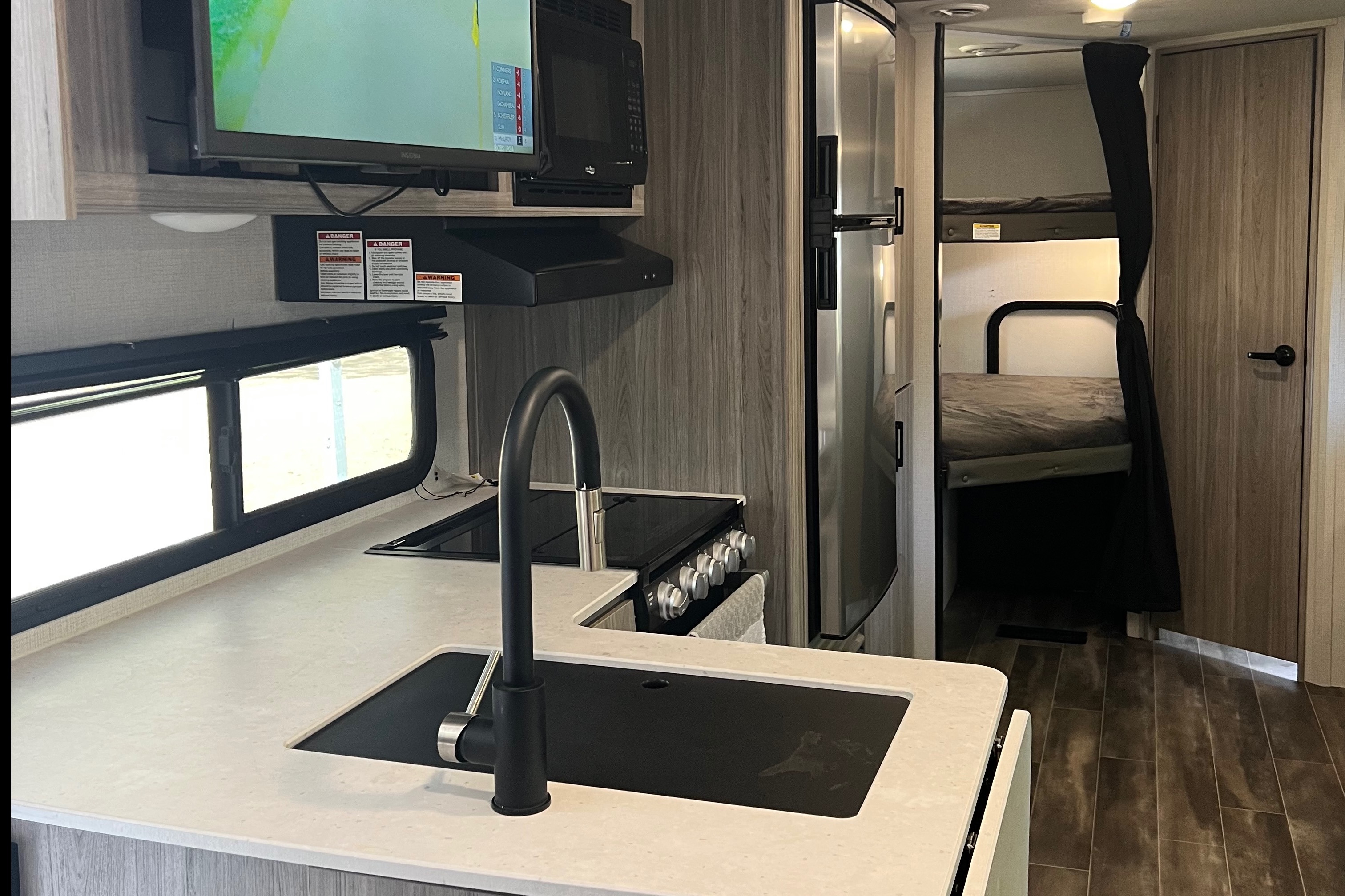 “Your Next Adventure” Keystone Passport SL Travel Trailer
