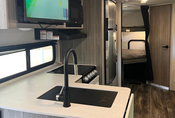 “Your Next Adventure” Keystone Passport SL Travel Trailer