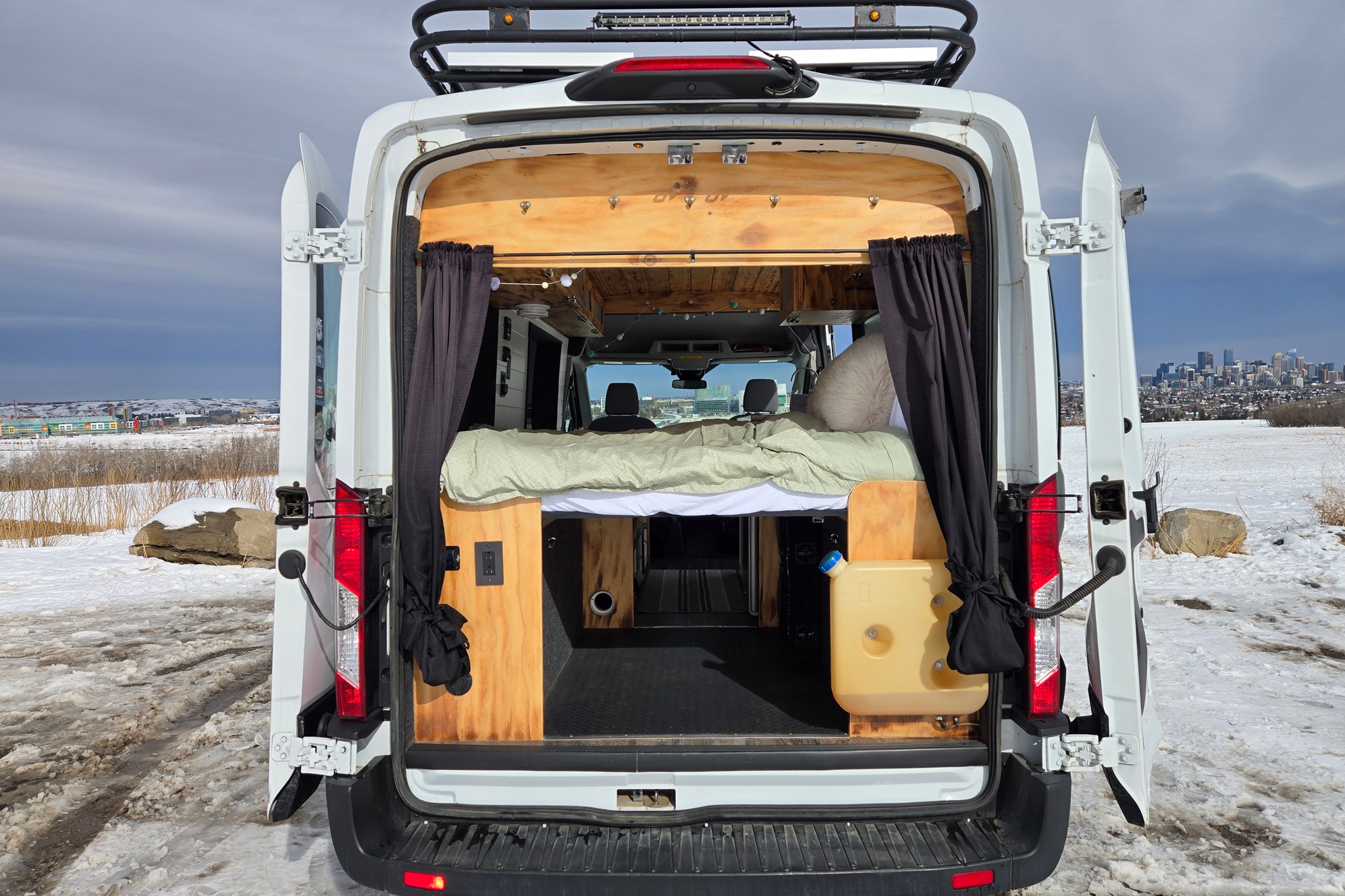Cozy and Versatile Camper Van - Adventure Ready Ford Transit