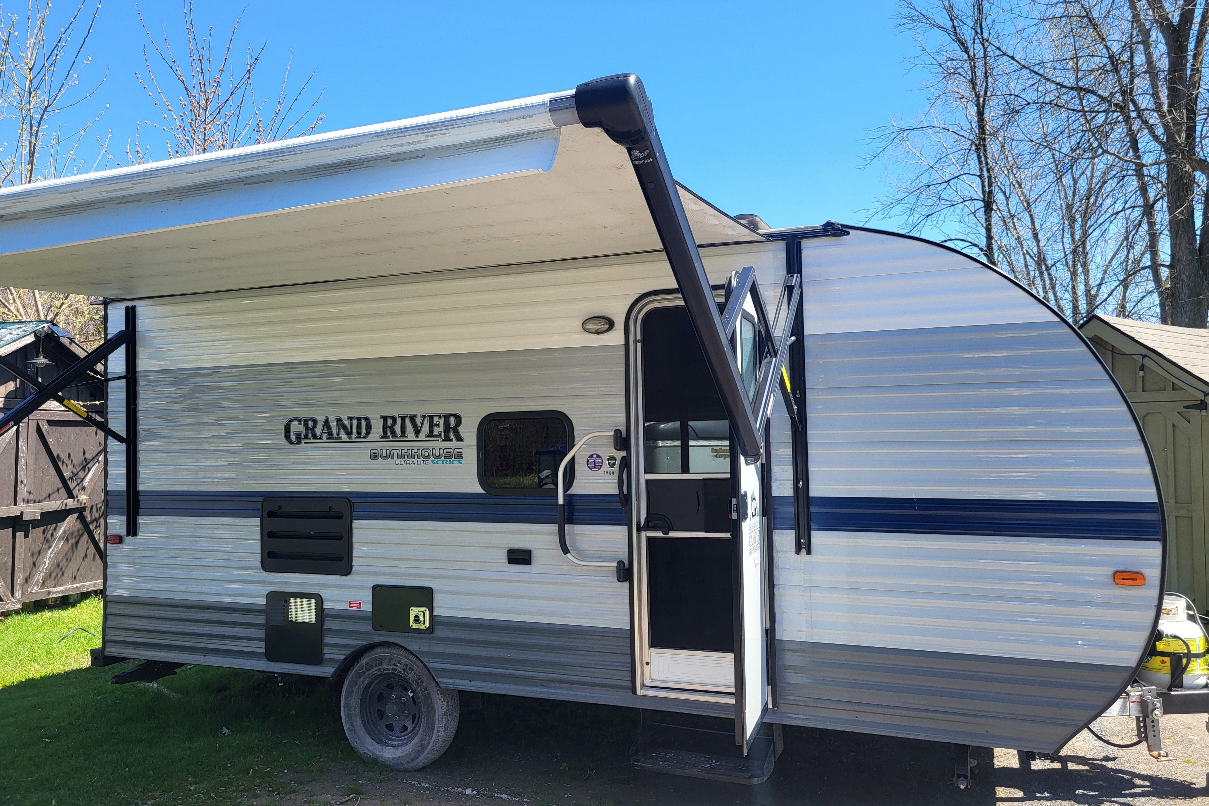 Venture in our Like New 2020 Grand River Bunkhouse Ultra-Lite Series Travel Trailer