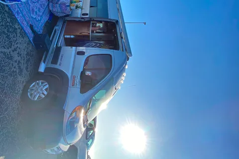 Luxury Class B Camper Van Glamping | King Bed, Bathroom, Generator