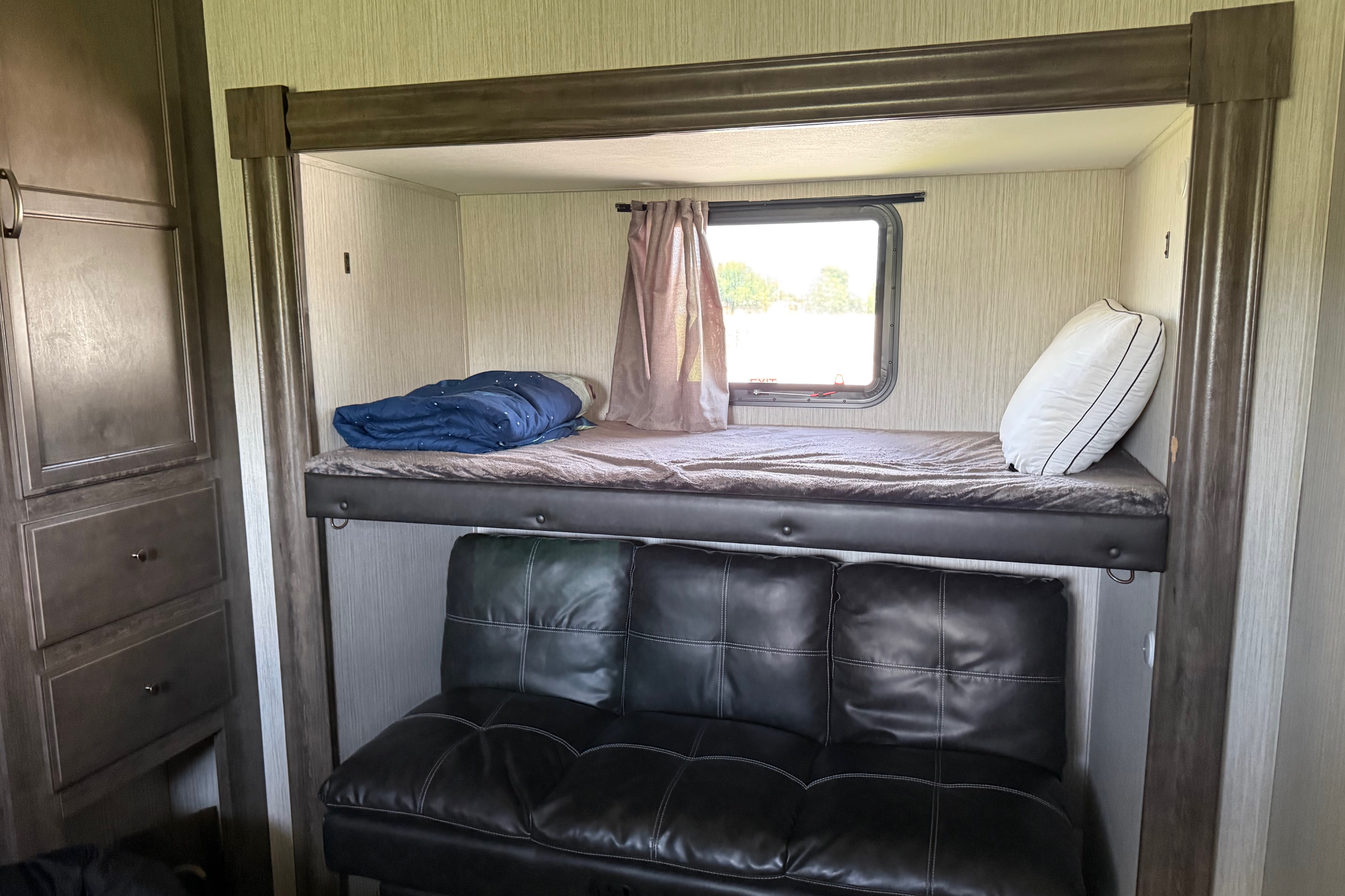 Camp with Comfort  Forest River Sandpiper 384QB0K Fifth Wheel