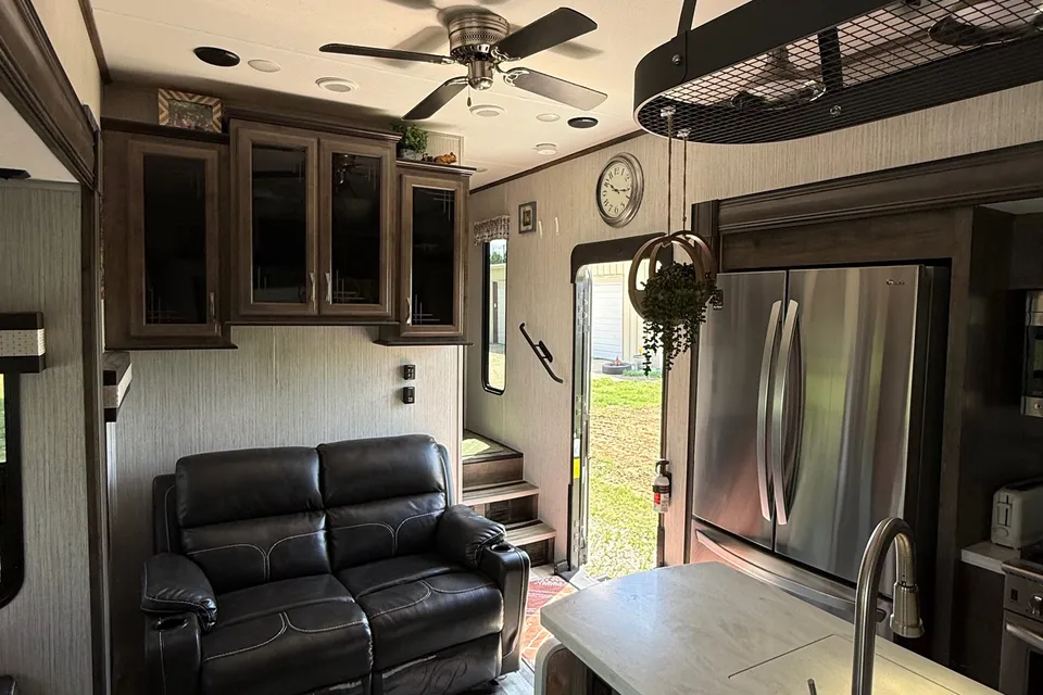 Camp with Comfort  Forest River Sandpiper 384QB0K Fifth Wheel