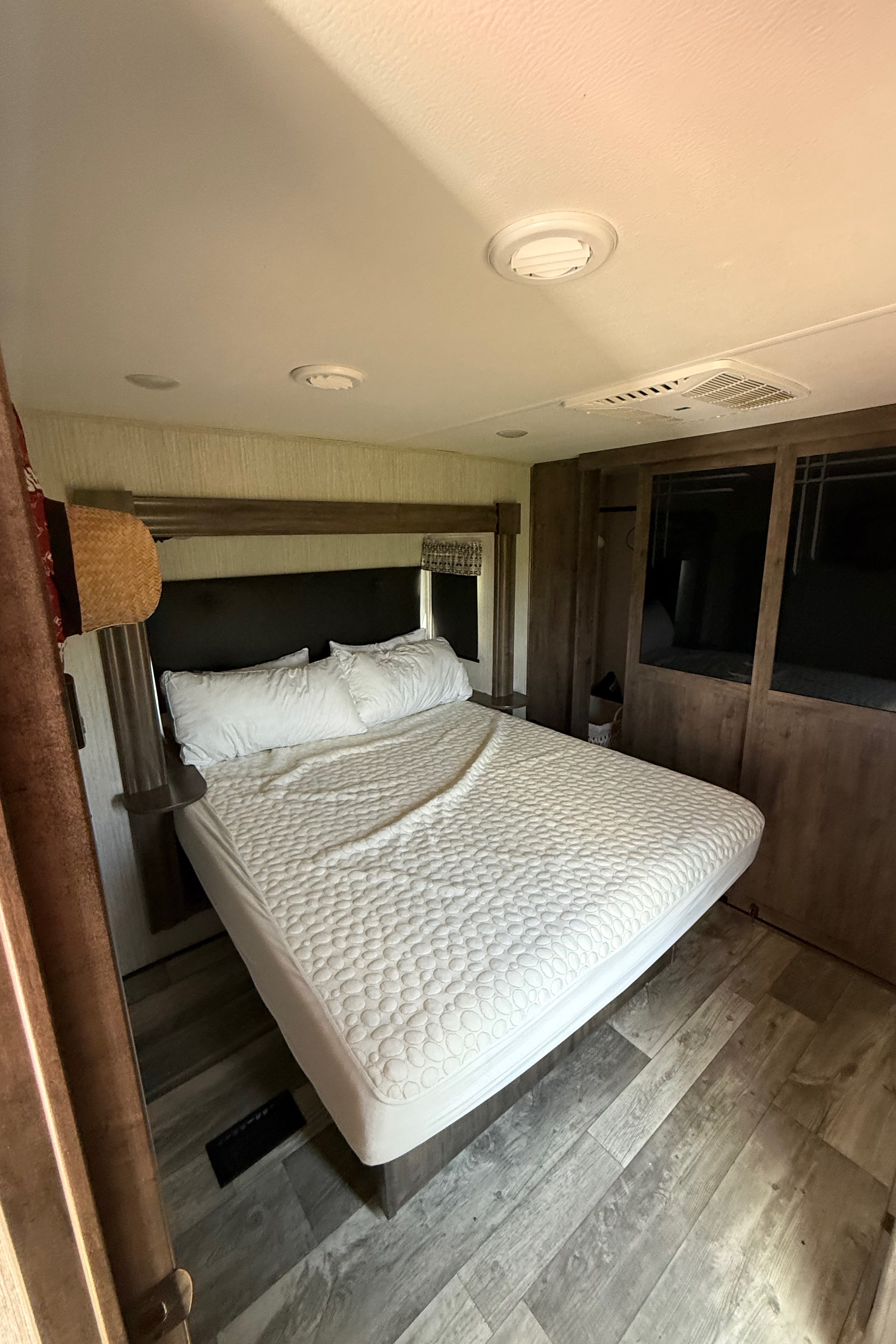 Camp with Comfort  Forest River Sandpiper 384QB0K Fifth Wheel