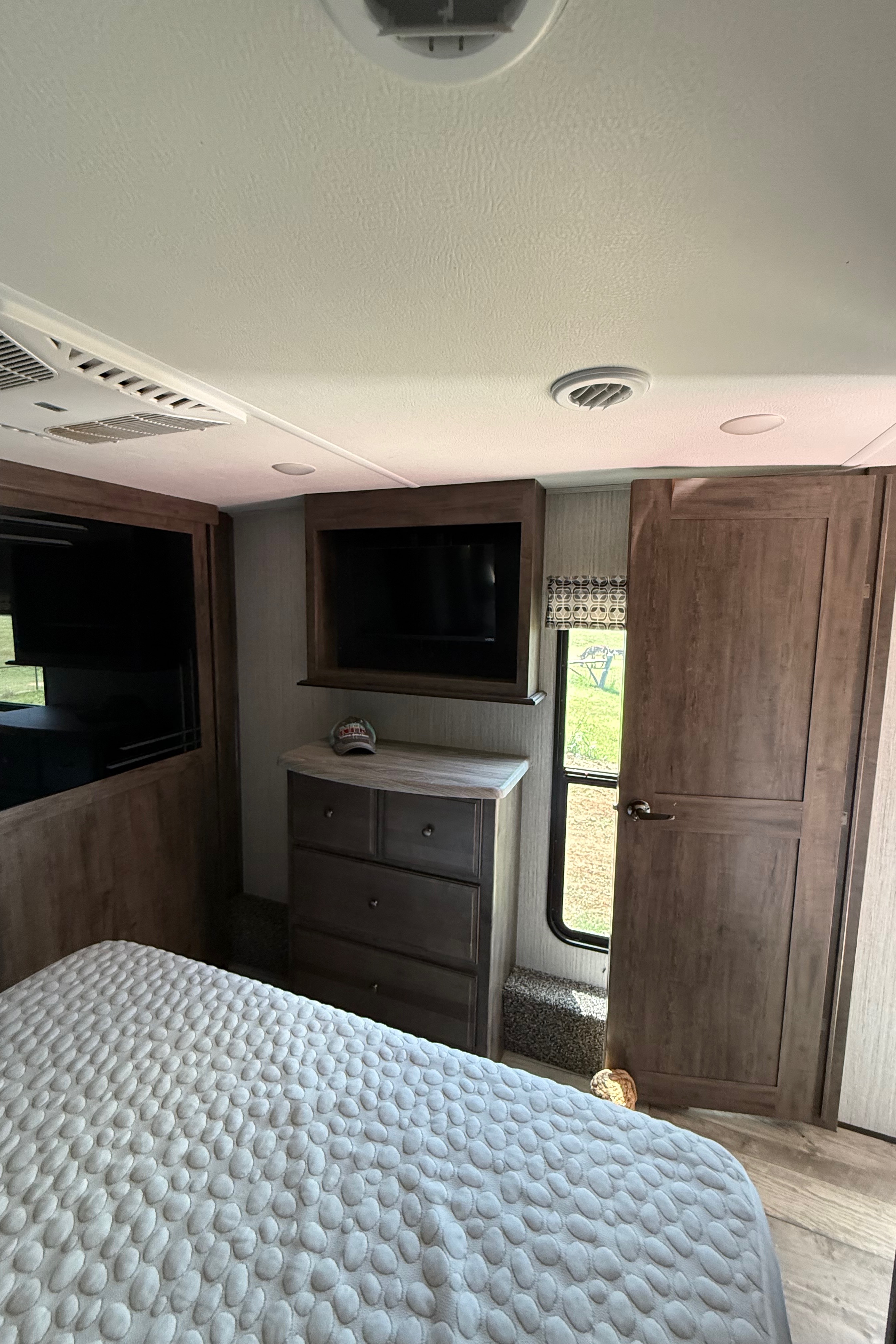 Camp with Comfort  Forest River Sandpiper 384QB0K Fifth Wheel