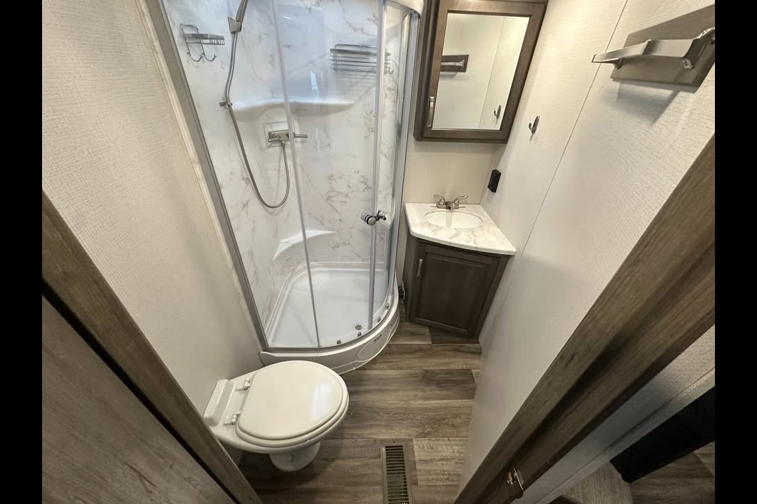 Half ton and family friendly Keystone Cougar 31 BHKWE Travel Trailer