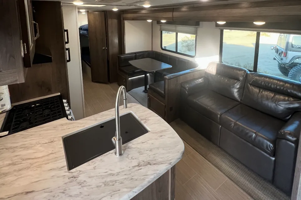 Ultimate Family Comfort! Keystone Passport 292BHWE with Bunkhouse and Outdoor Kitchen!