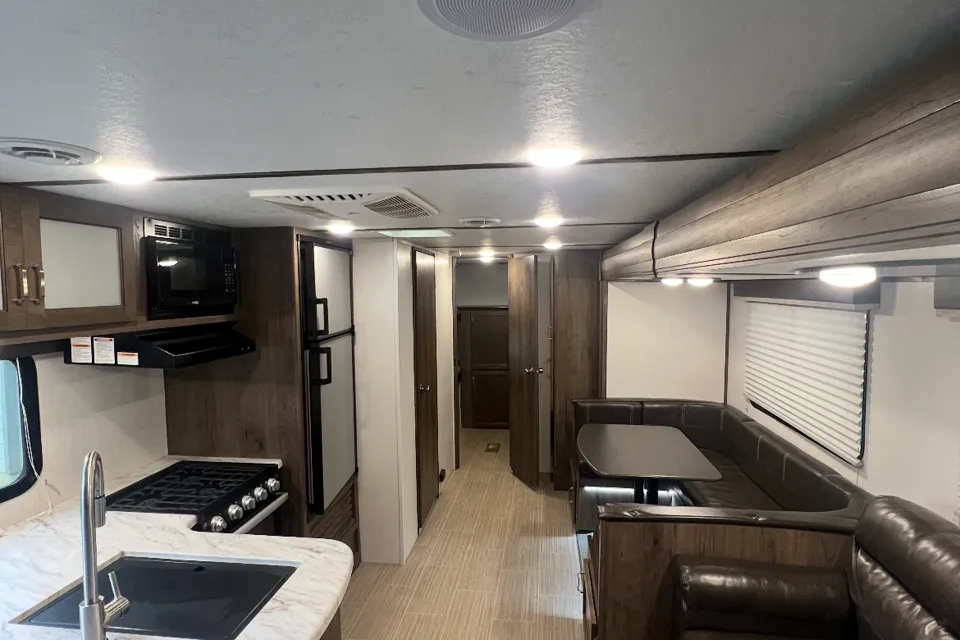 Ultimate Family Comfort! Keystone Passport 292BHWE with Bunkhouse and Outdoor Kitchen!