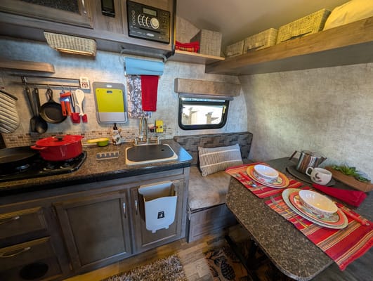 Cozy Red Winnie Drop • Not your typical travel trailer