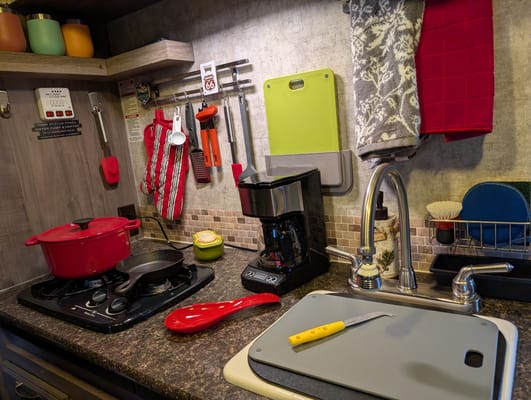 Cozy Red Winnie Drop • Not your typical travel trailer