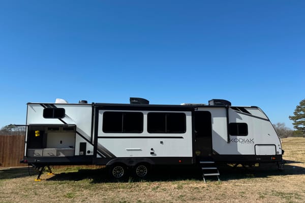 The 4G's Dutchmen Kodiak Ultimate Travel Trailer