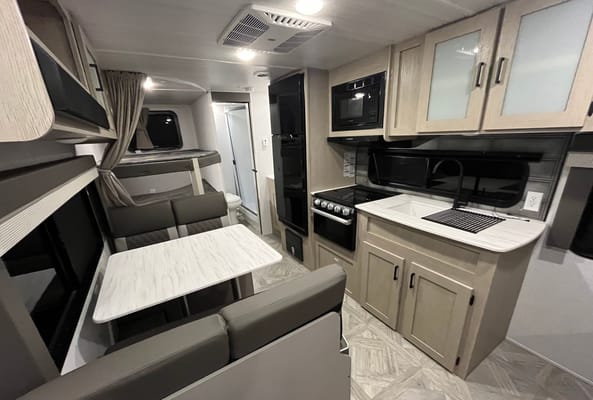 Bigfoot Adventure LLC's Forest River wildwood x-lite 231bhxl Travel Trailer