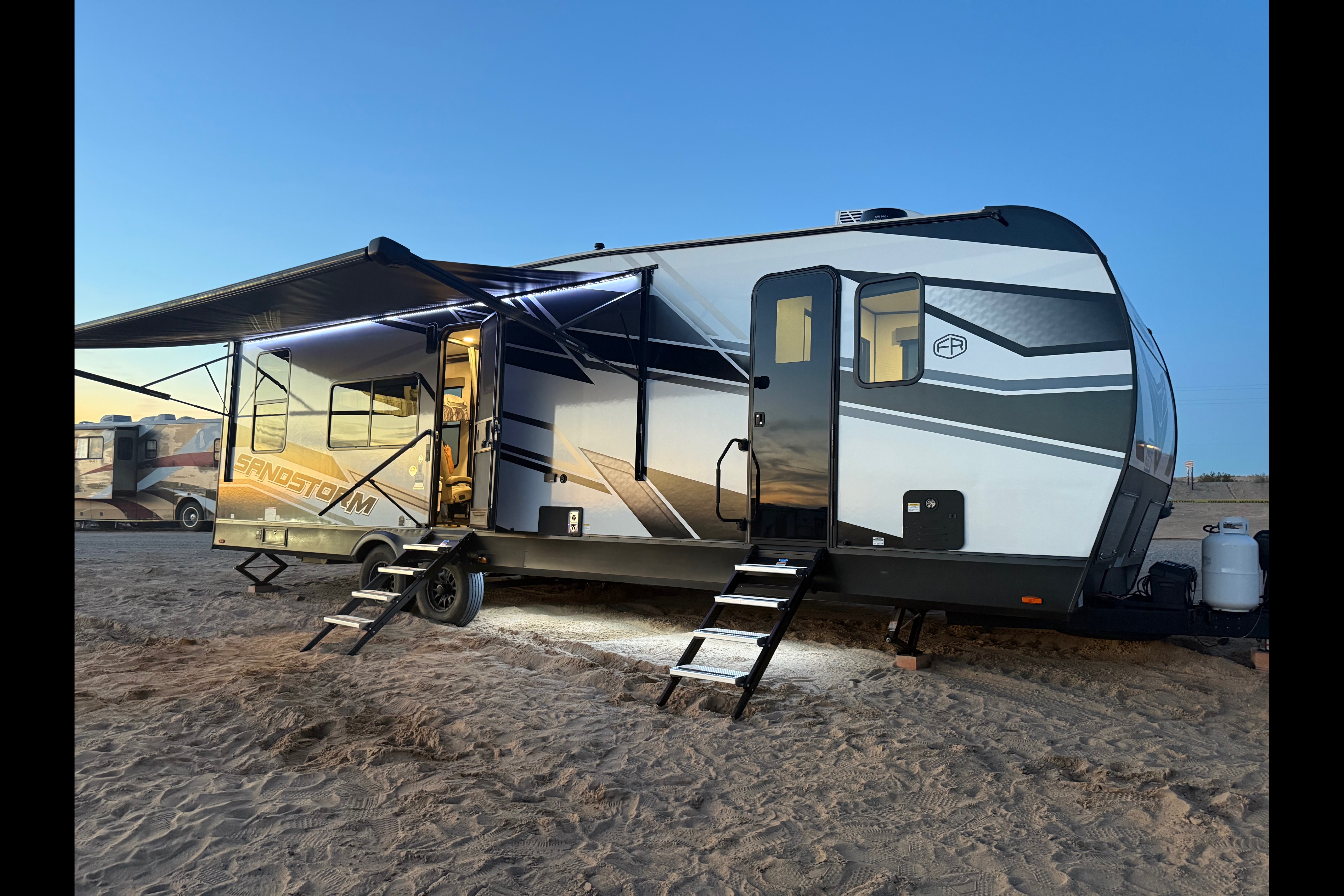 Aracely’s Forest River Sandstorm Toy Hauler