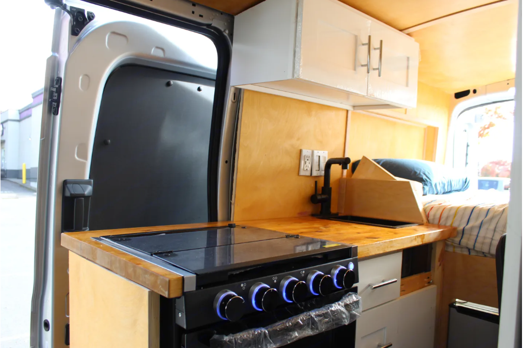 All-Electric 2023 Ford Camper van with Wifi, Office & Comforts!