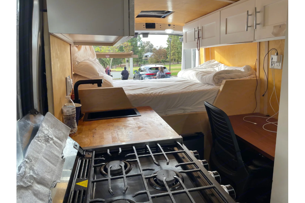 All-Electric 2023 Ford Camper van with Wifi, Office & Comforts!