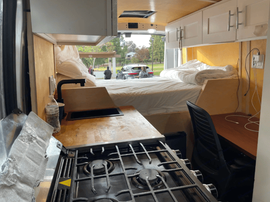All-Electric 2023 Ford Camper van with Wifi, Office & Comforts!