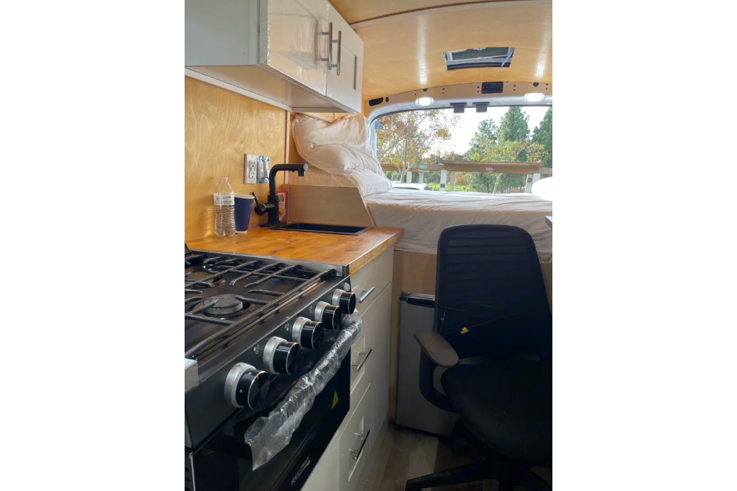 All-Electric 2023 Ford Camper van with Wifi, Office & Comforts!