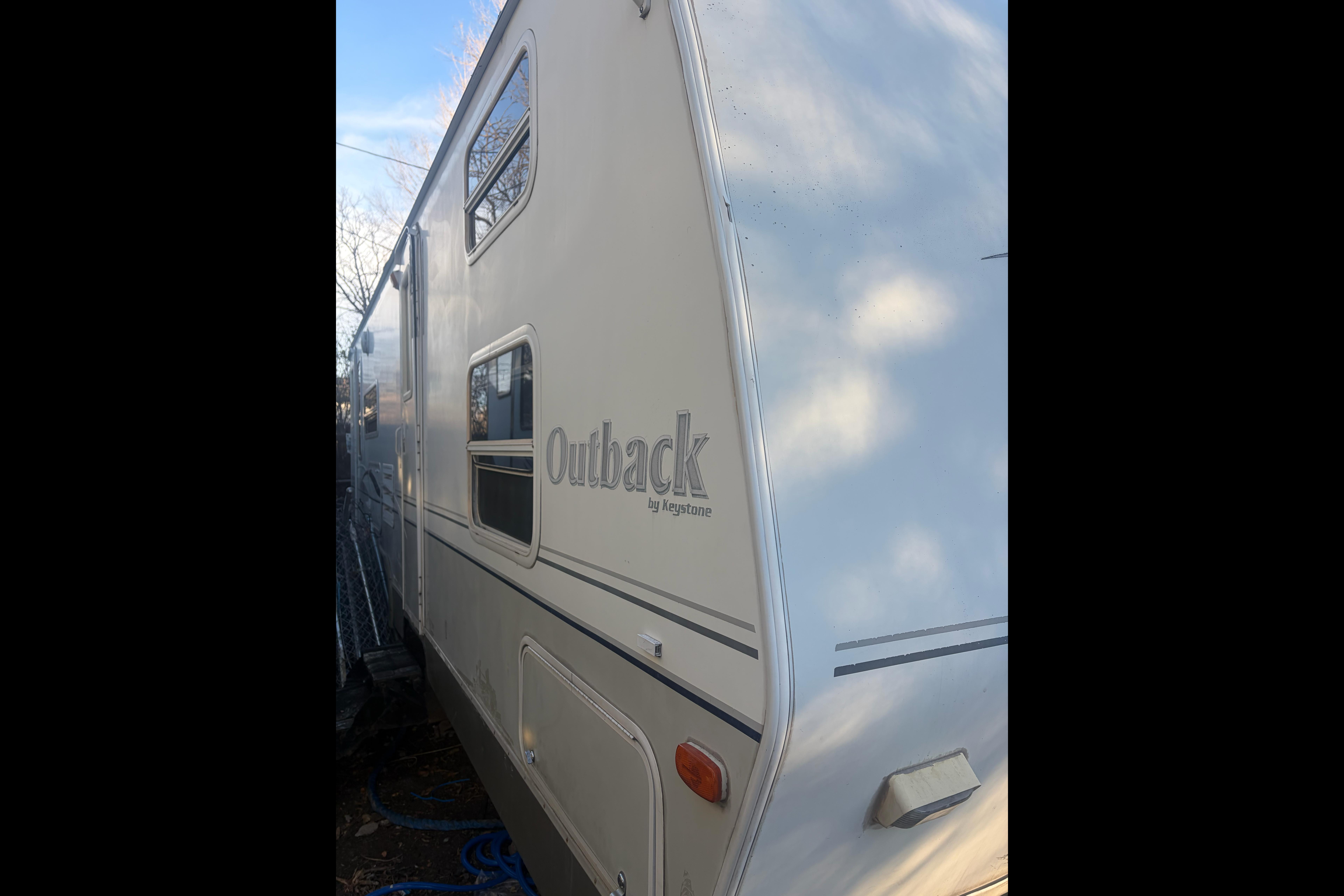 Ruben's Keystone Outback 28rss Travel Trailer