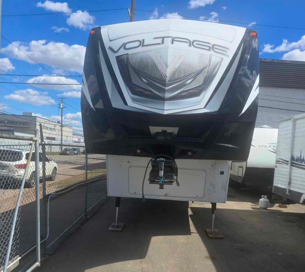 Longhorn Customs 2014 Dutchmen Voltage Fifth Wheel Toy Hauler your home away from home