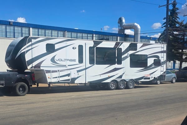 Longhorn Customs 2014 Dutchmen Voltage Fifth Wheel Toy Hauler your home away from home