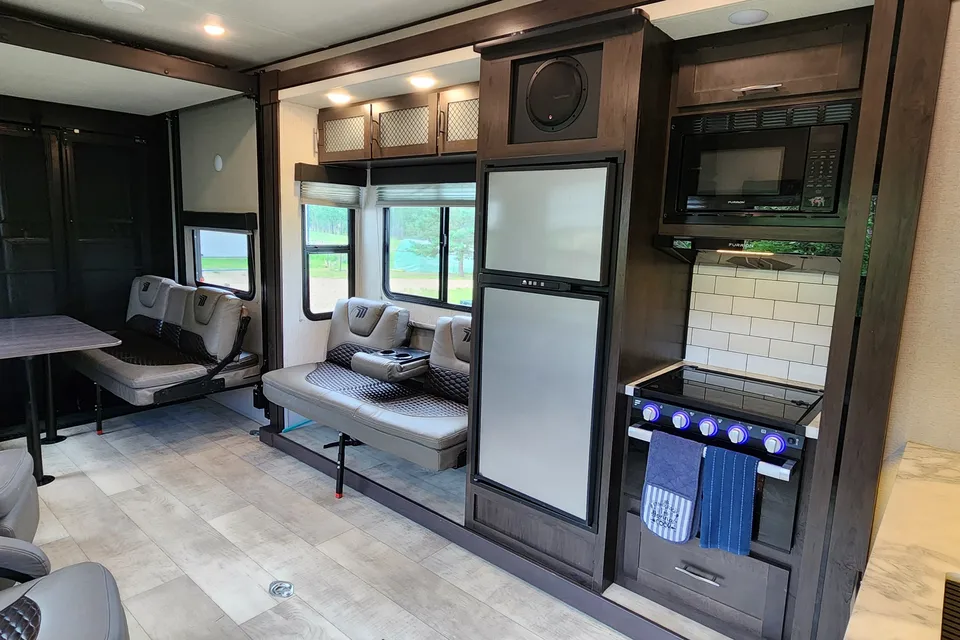 Miss Daisy's Grand Design Momentum G-class Toy Hauler