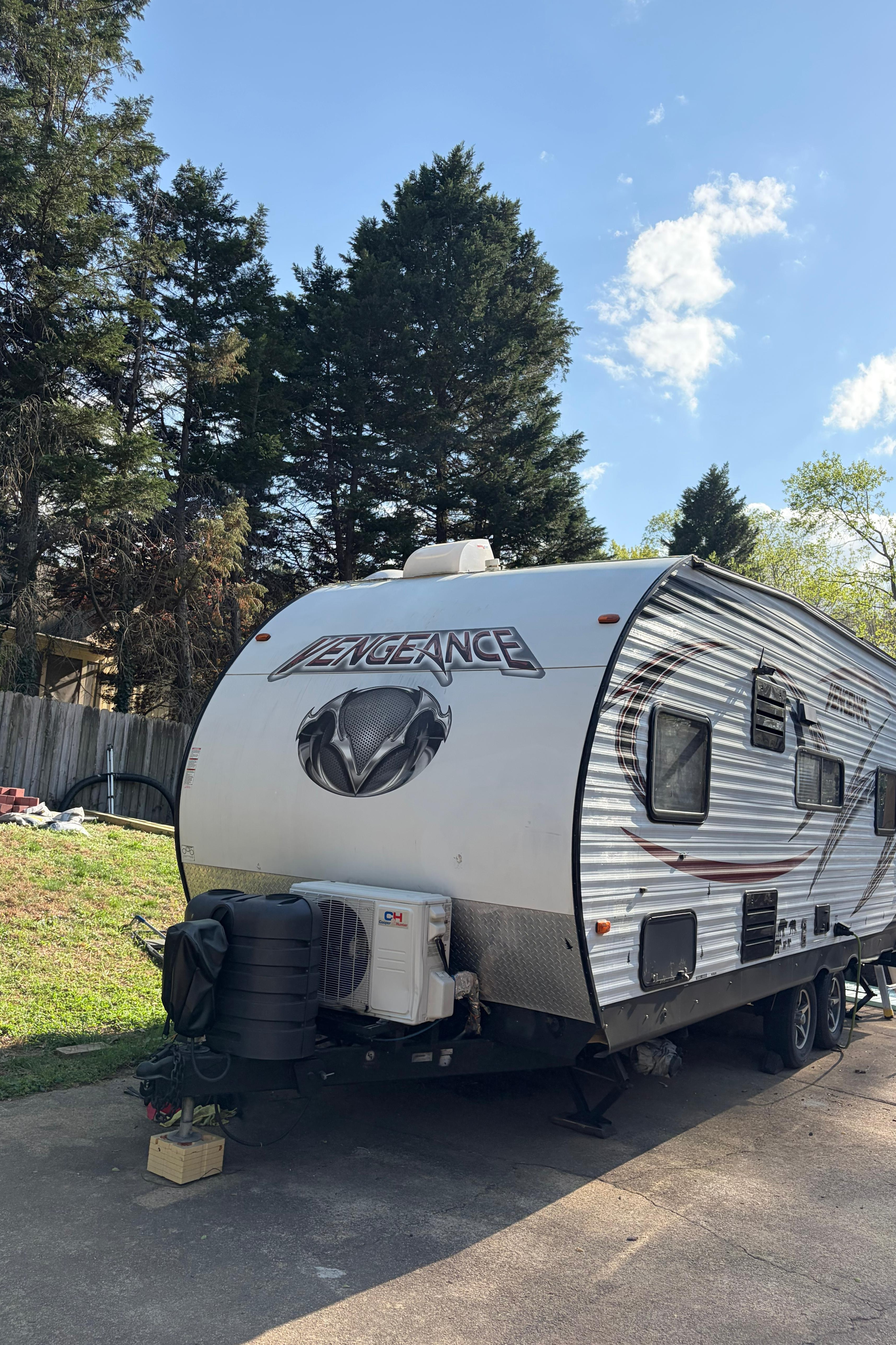 Roberto's Forest River Vengeance small Toy Hauler with porch