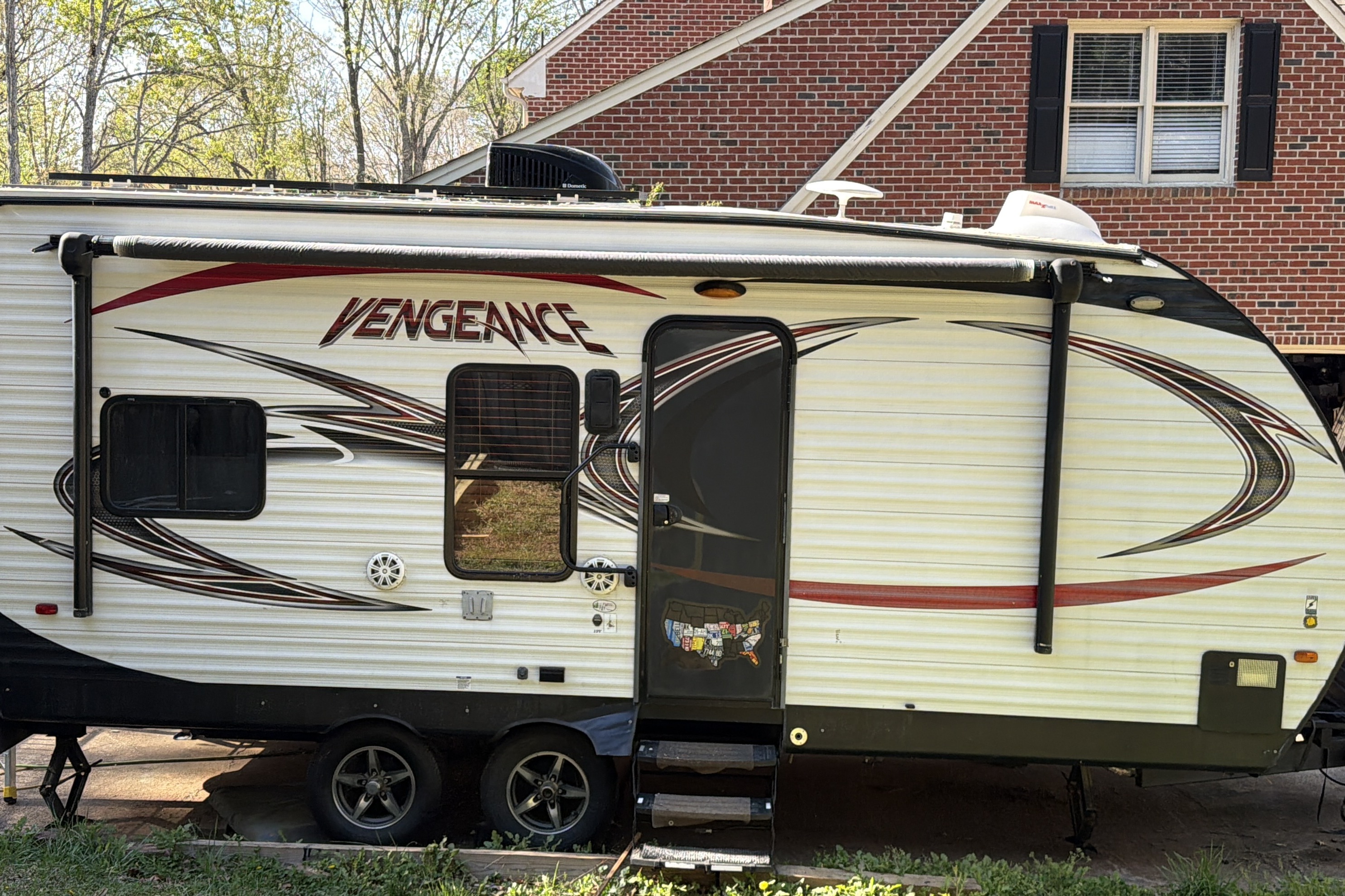 Roberto's Forest River Vengeance small Toy Hauler with porch