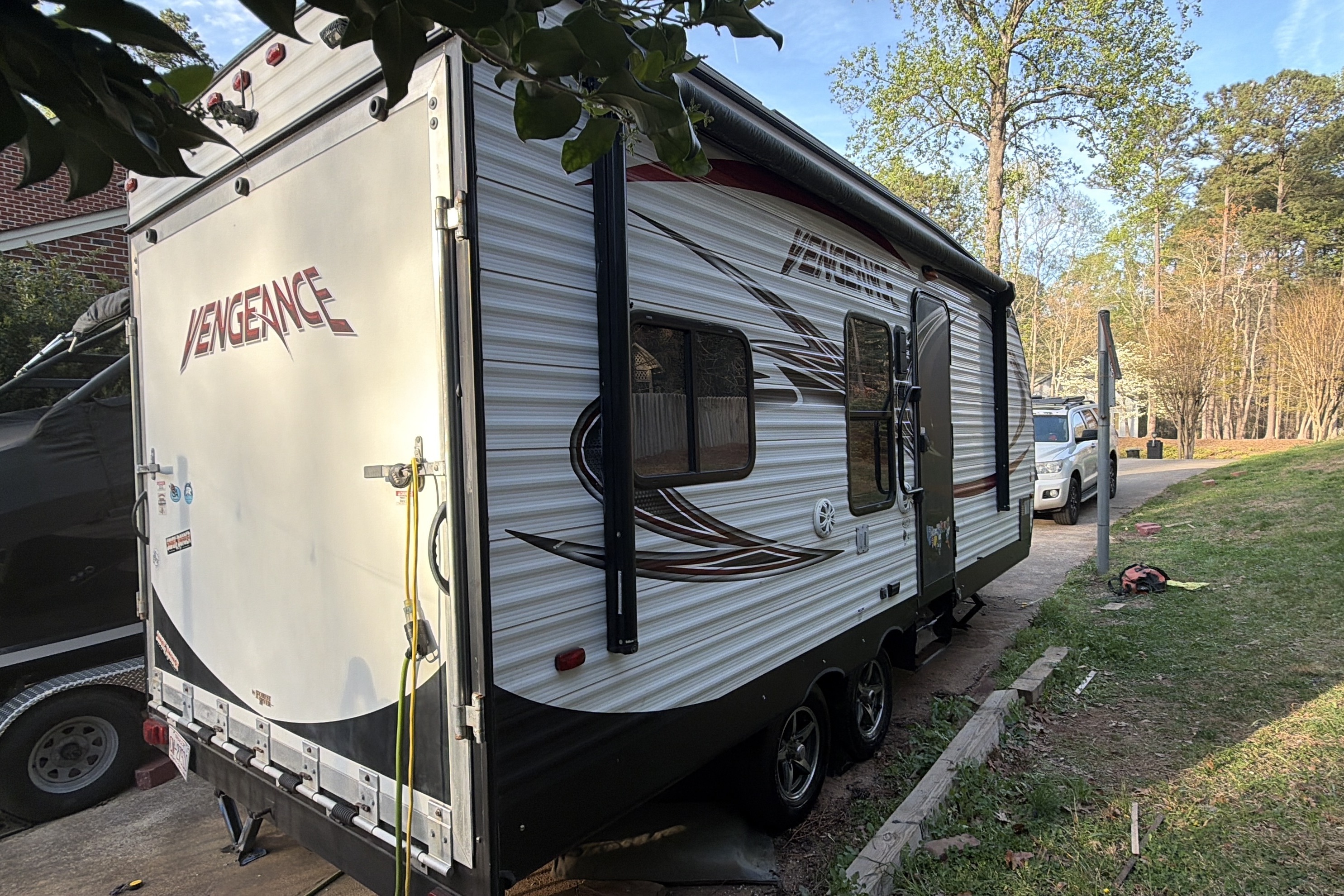 Roberto's Forest River Vengeance small Toy Hauler with porch