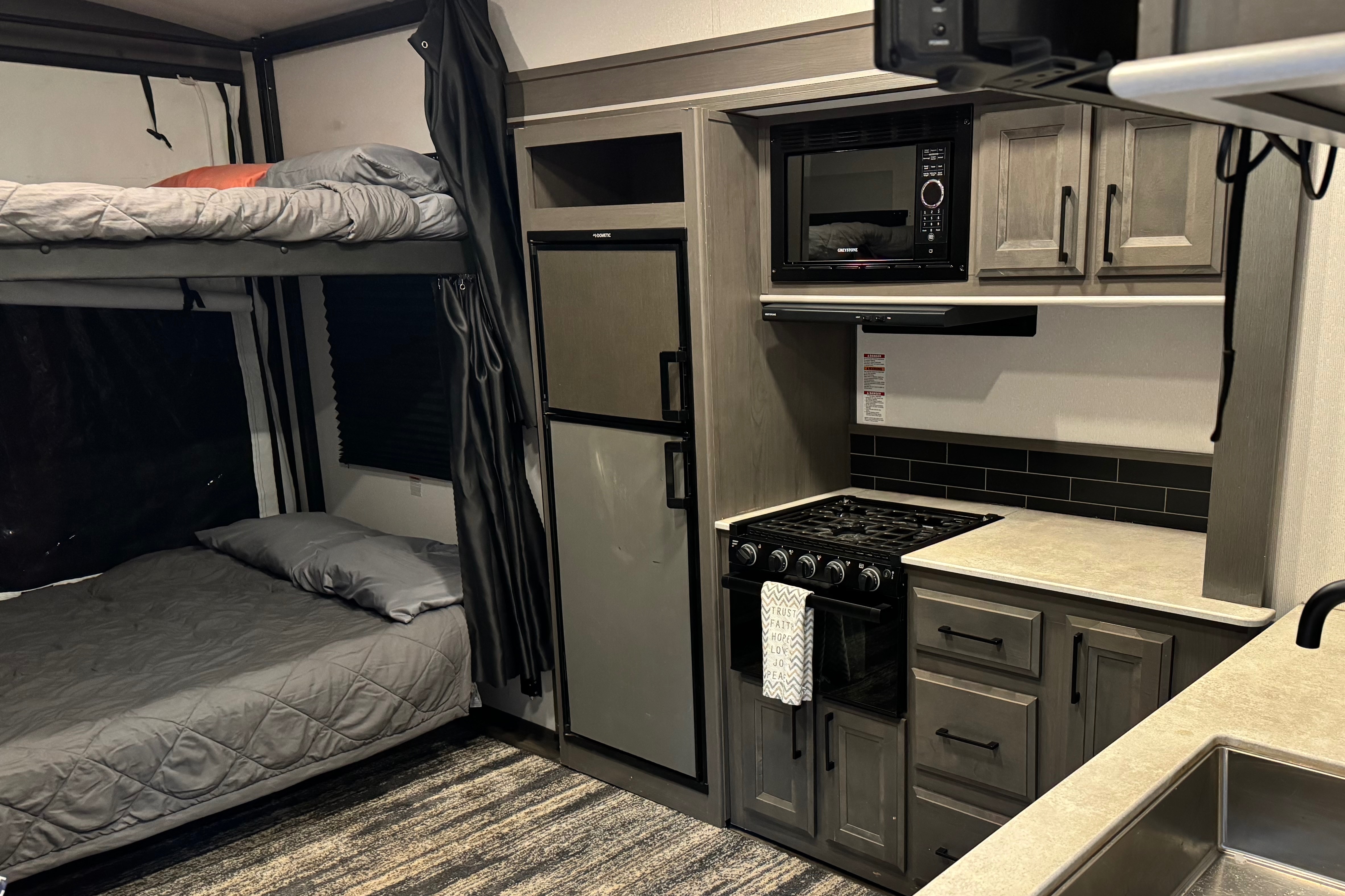 2021 30ft. Toy hauler with free kayaks and paddle boards