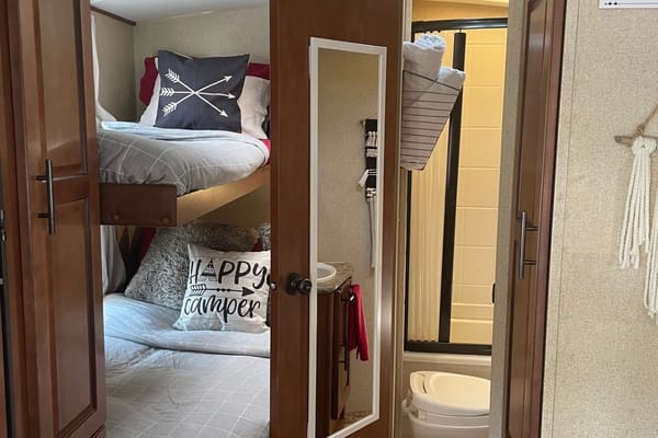 28ft Cabin Comfy with Slide Out and Bunks!