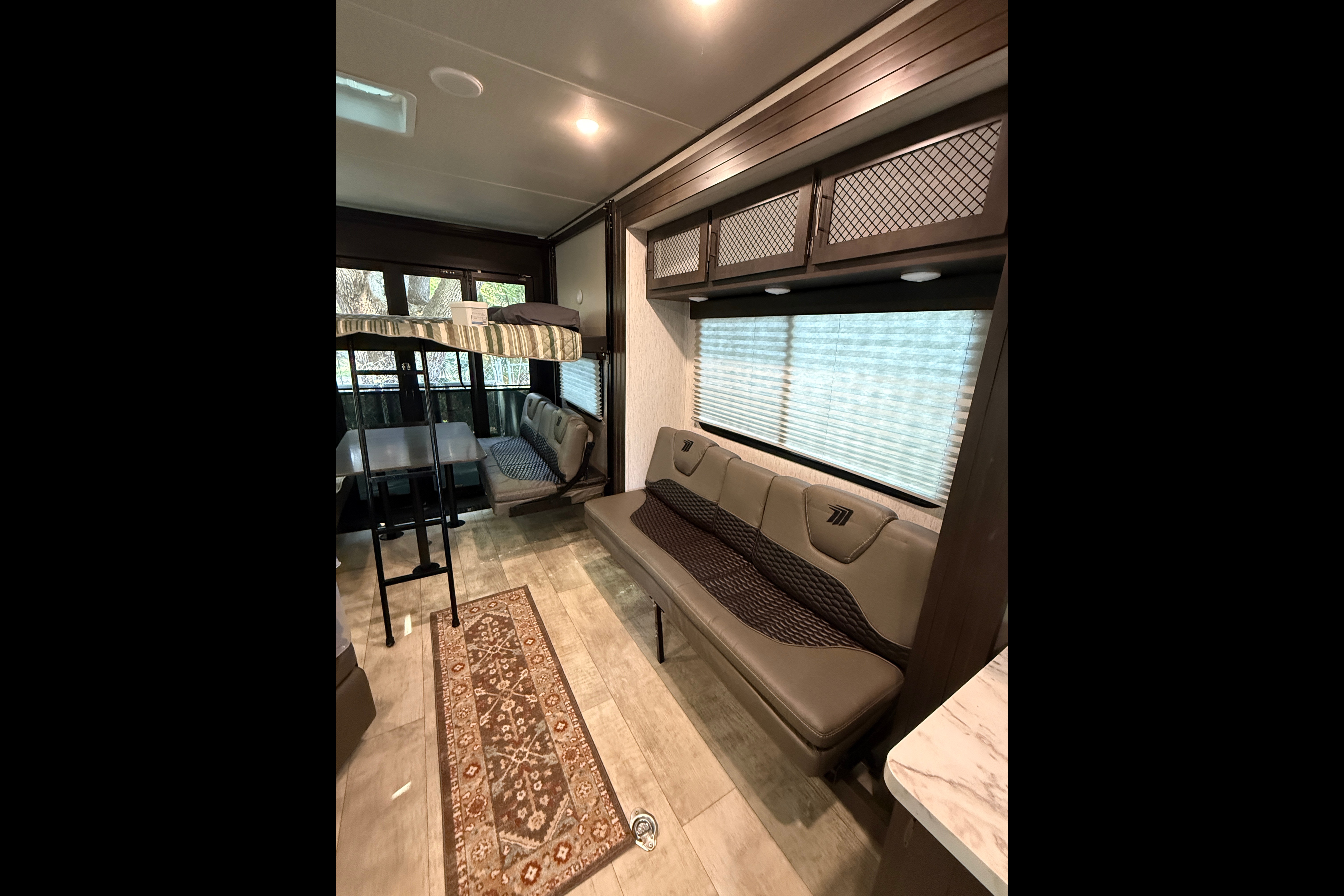 Moira's Mansion 2022 Grand Design Momentum Toy Hauler