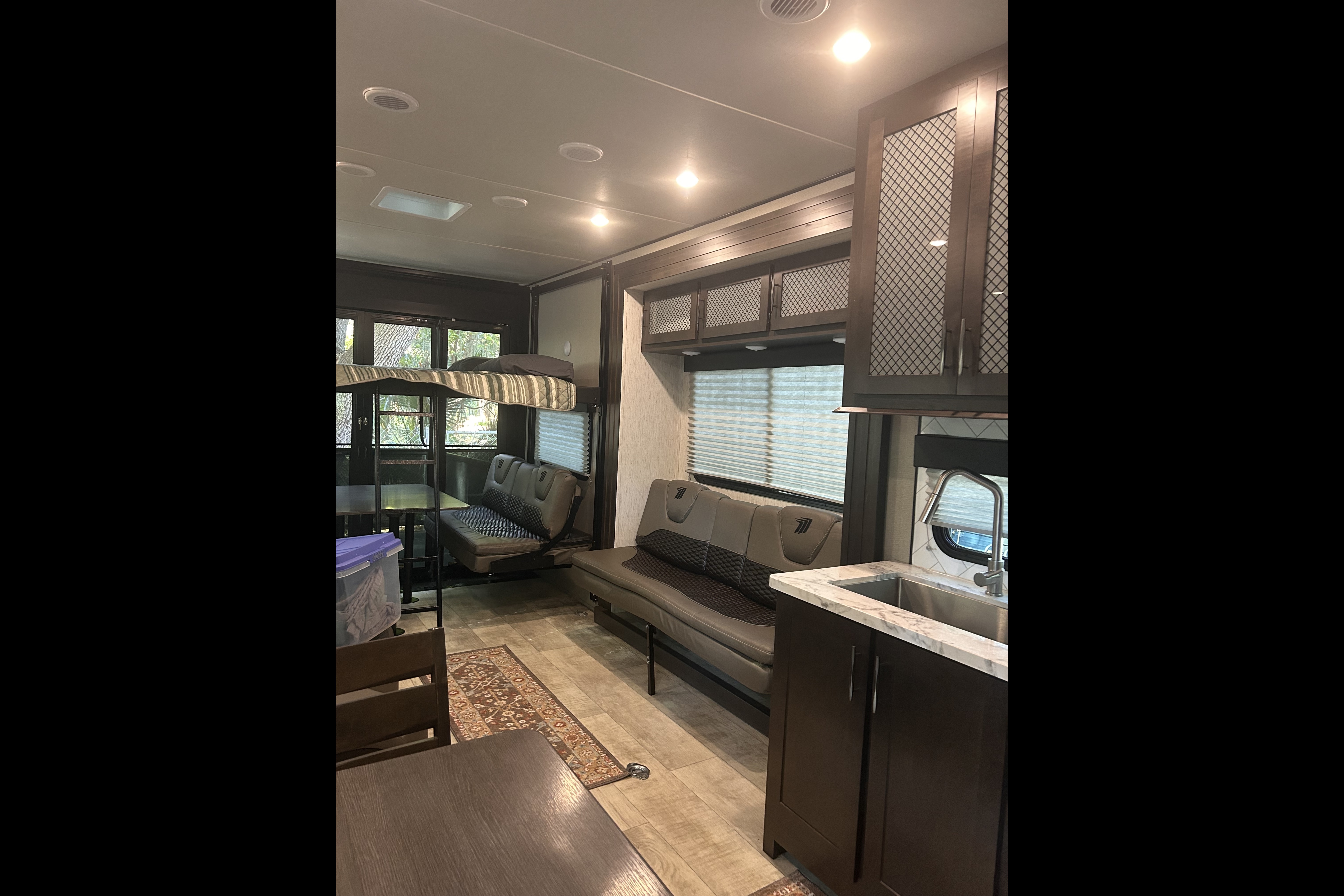 Moira's Mansion 2022 Grand Design Momentum Toy Hauler
