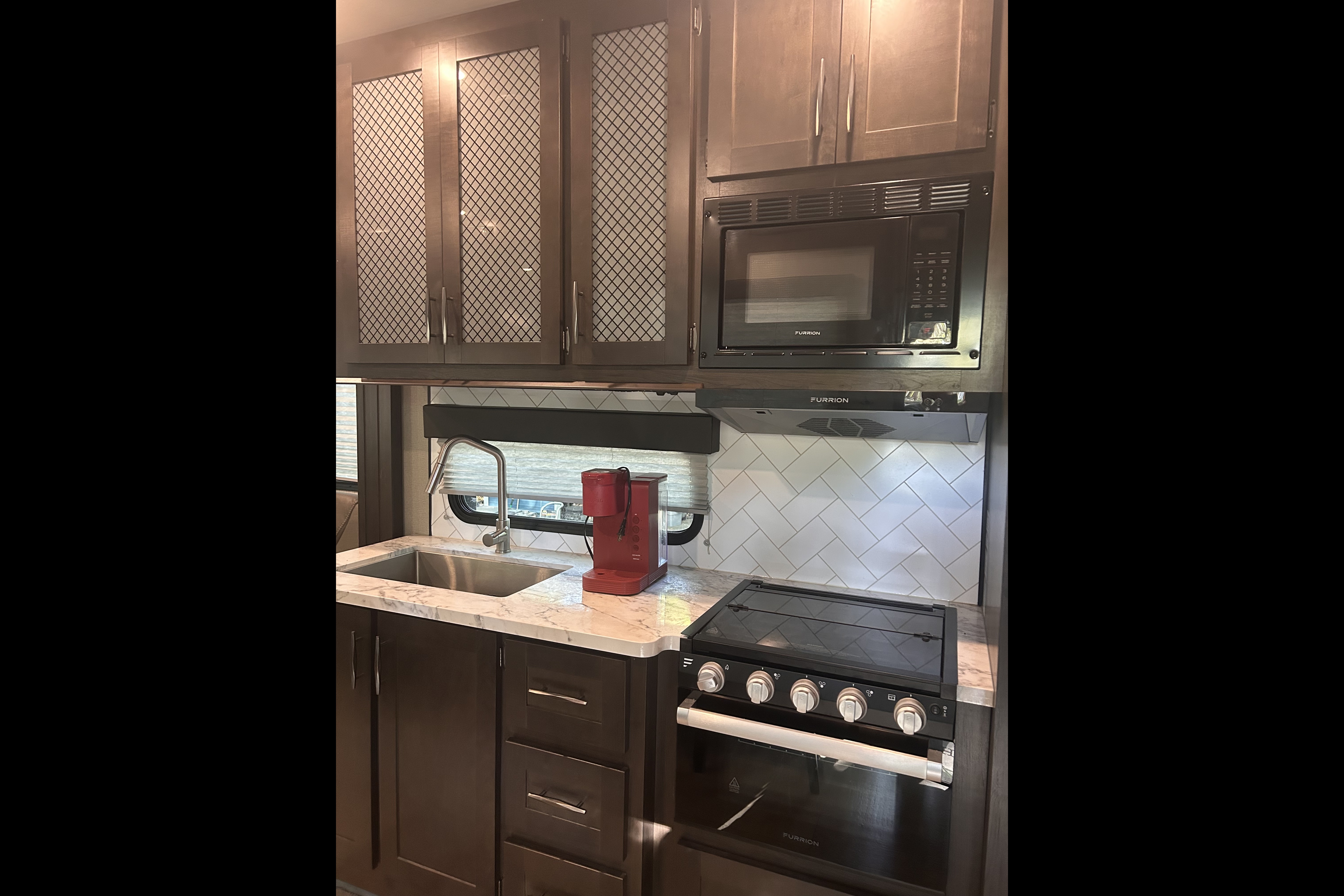Moira's Mansion 2022 Grand Design Momentum Toy Hauler