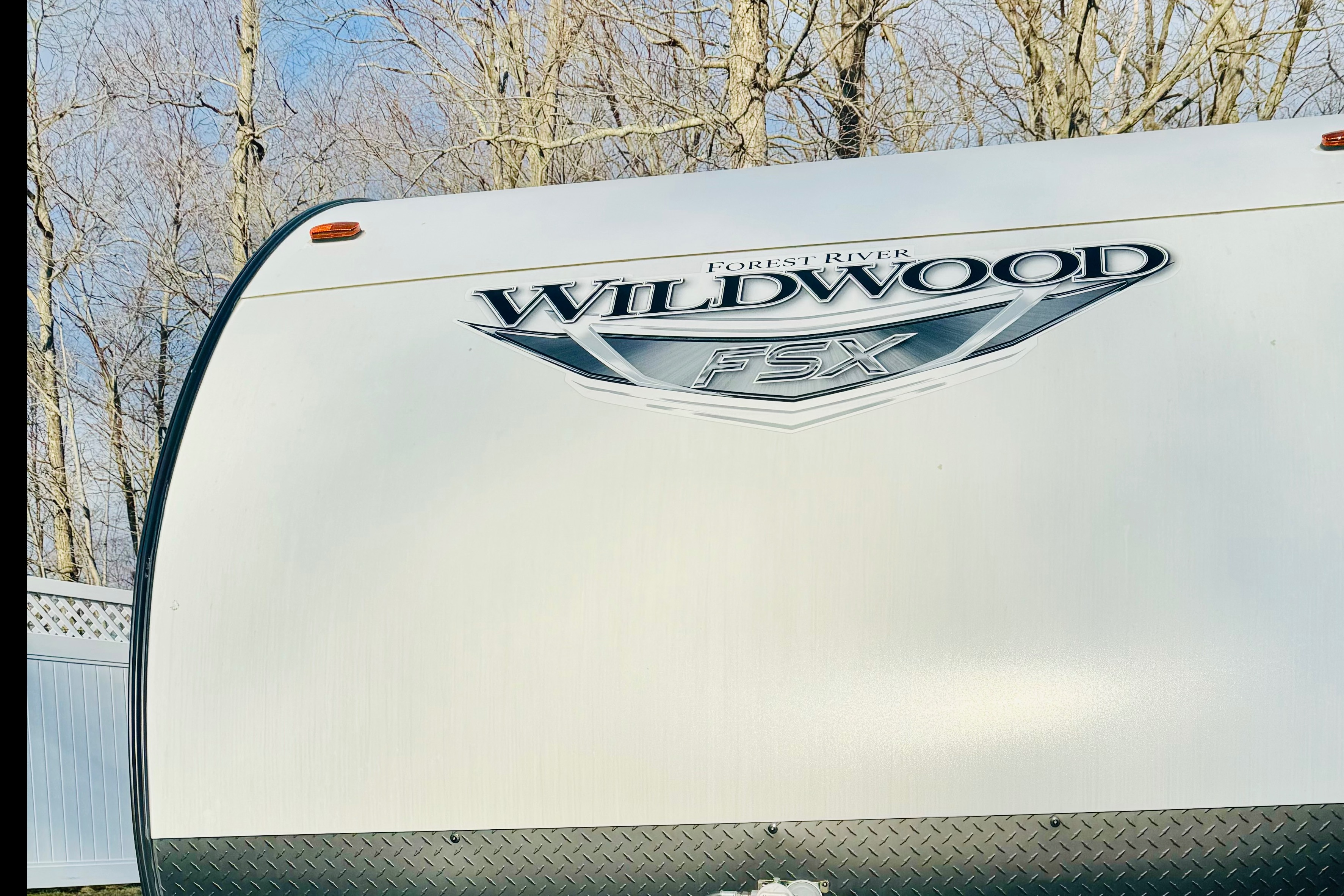 Pettie Family-Size Forest River Wildwood FSX 179DBK Travel Trailer