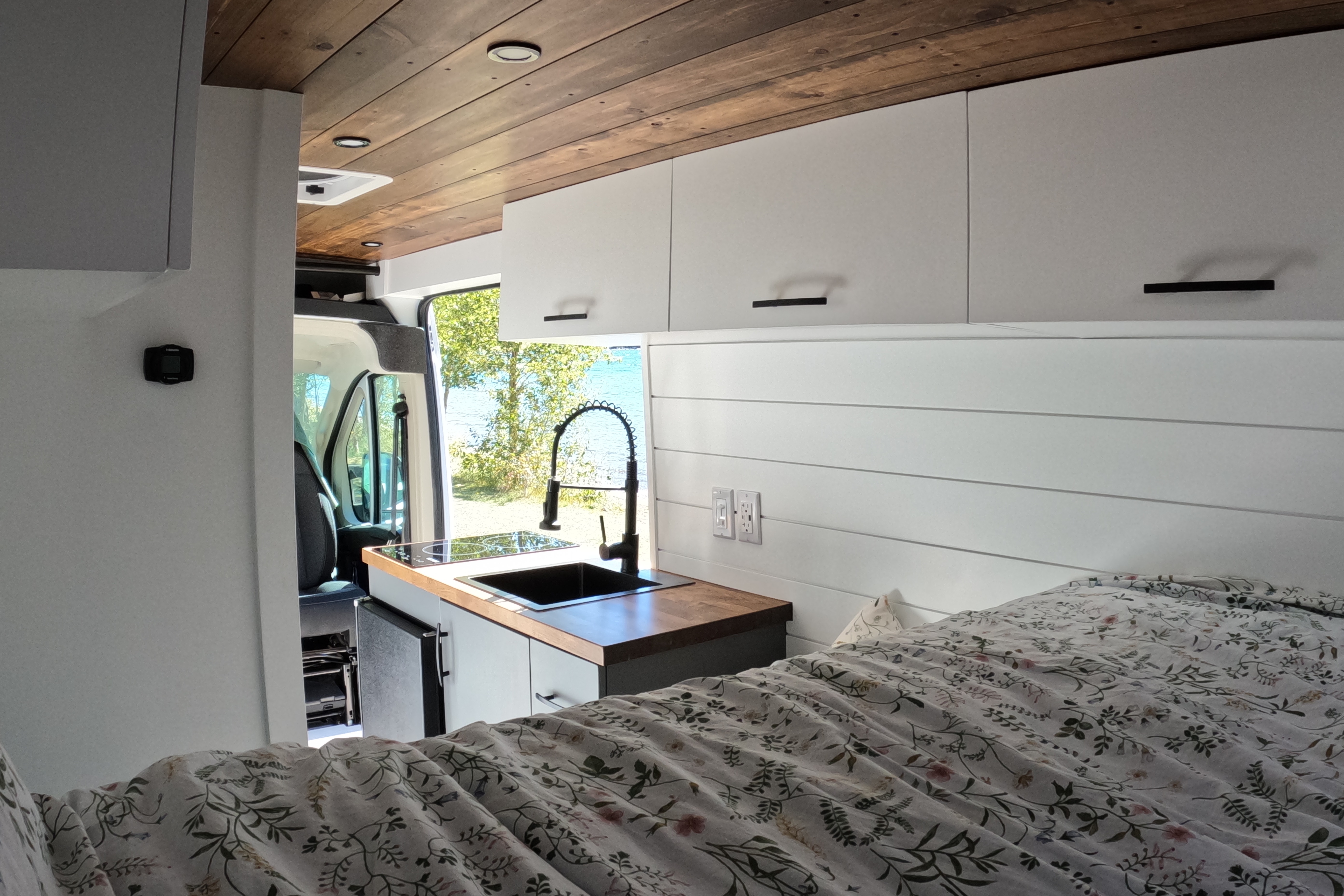 Cozy custom crafted van with Shower, Toilet, A/C , Heat, Solar and more