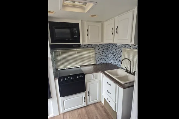 Eric & Sue,s Forest River Surveyor Travel Trailer