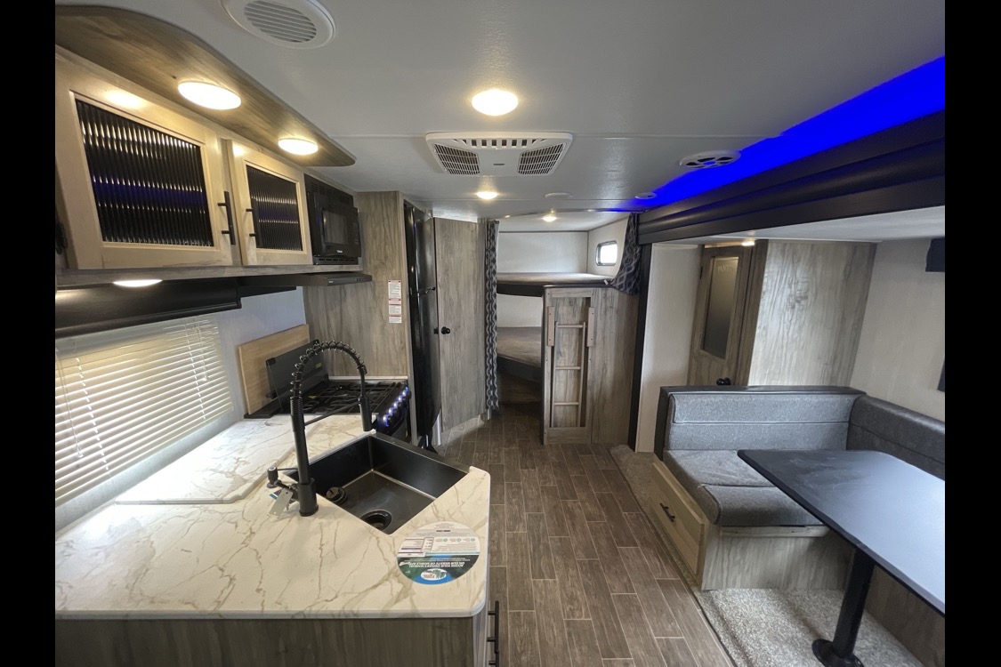 Custom stabilizers for “no rocking” while leveled Bunkhouse Trailer fully furnished and delivered