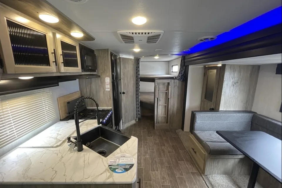 Custom stabilizers for “no rocking” while leveled Bunkhouse Trailer fully furnished and delivered