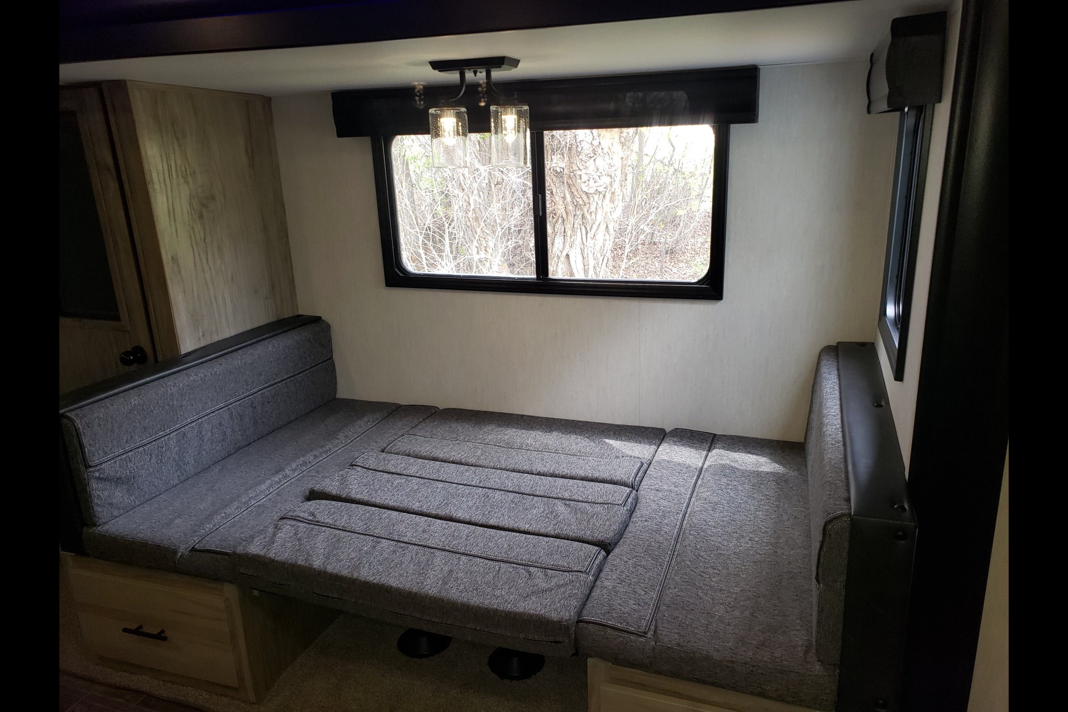 Custom stabilizers for “no rocking” while leveled Bunkhouse Trailer fully furnished and delivered