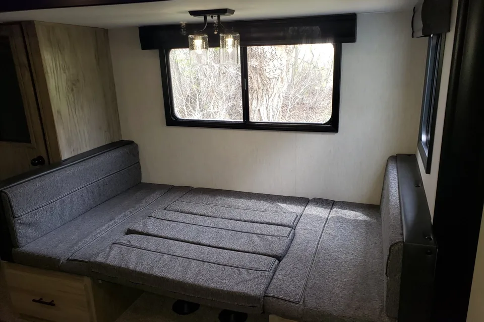 Custom stabilizers for “no rocking” while leveled Bunkhouse Trailer fully furnished and delivered