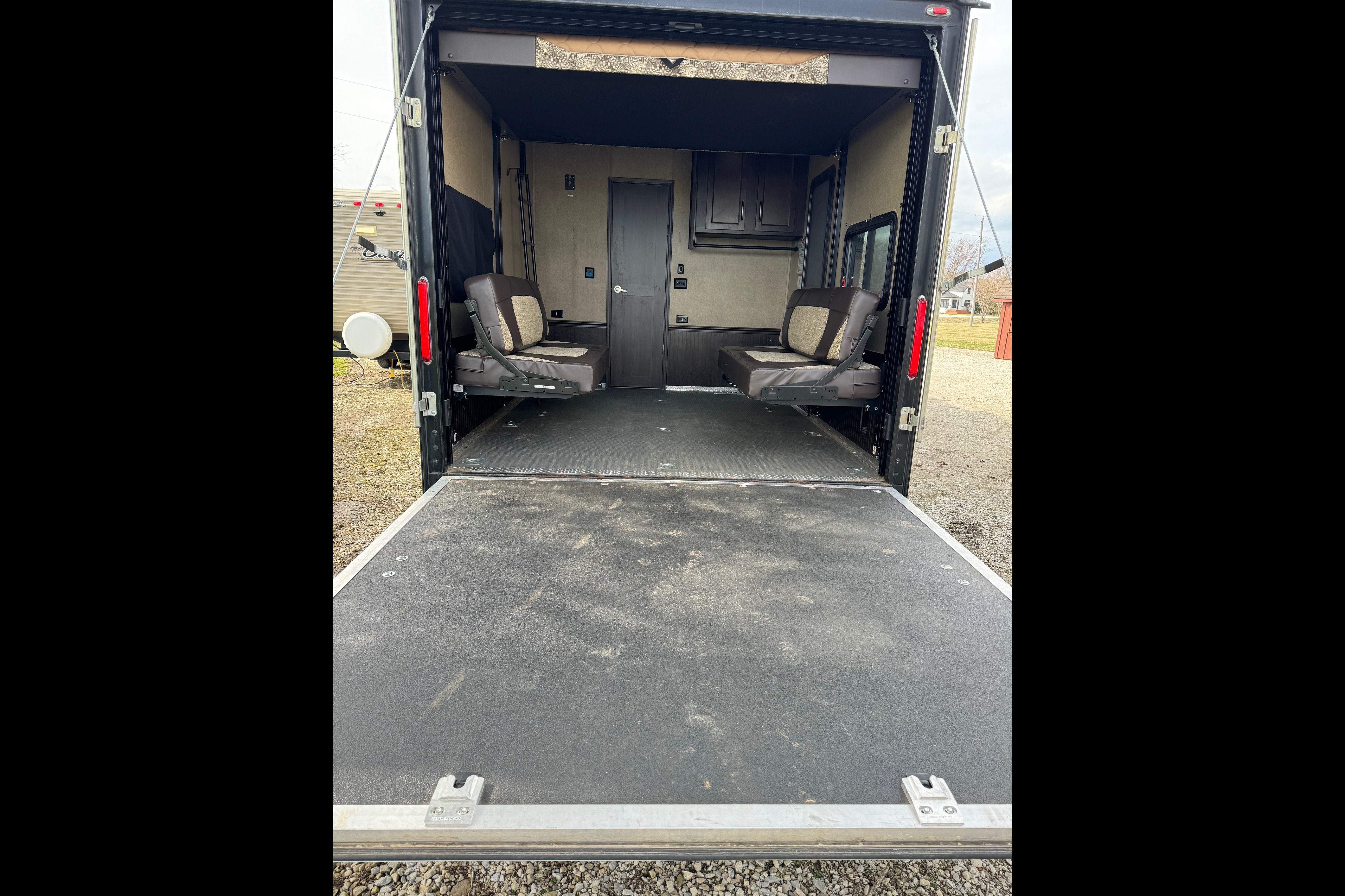 Spacious Toy Hauler Trailer: Queen Beds, Massage Sofa, A/C & More!